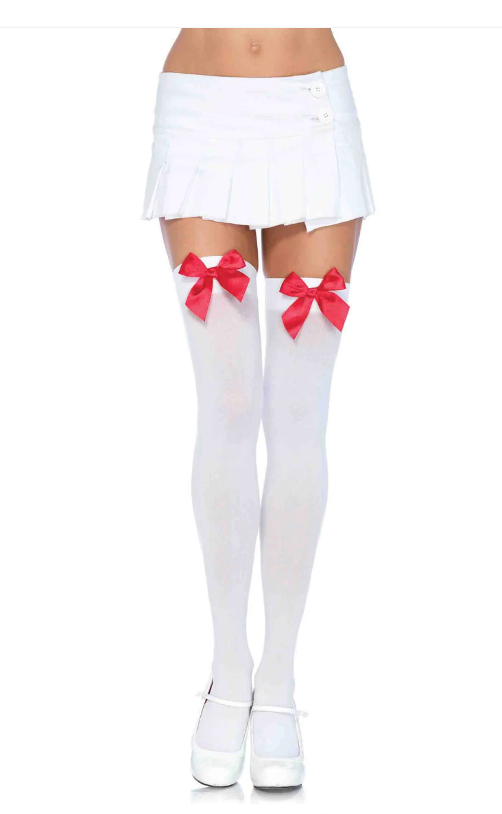 Model wearing white over-the-knee socks with red satin bows and a white pleated mini skirt