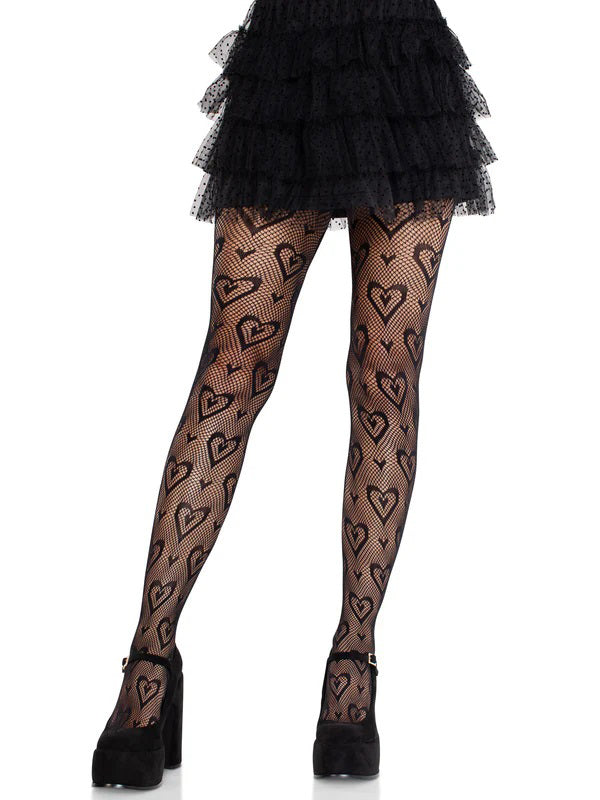 Black heart-patterned fishnet stockings worn with a black skirt on a white background